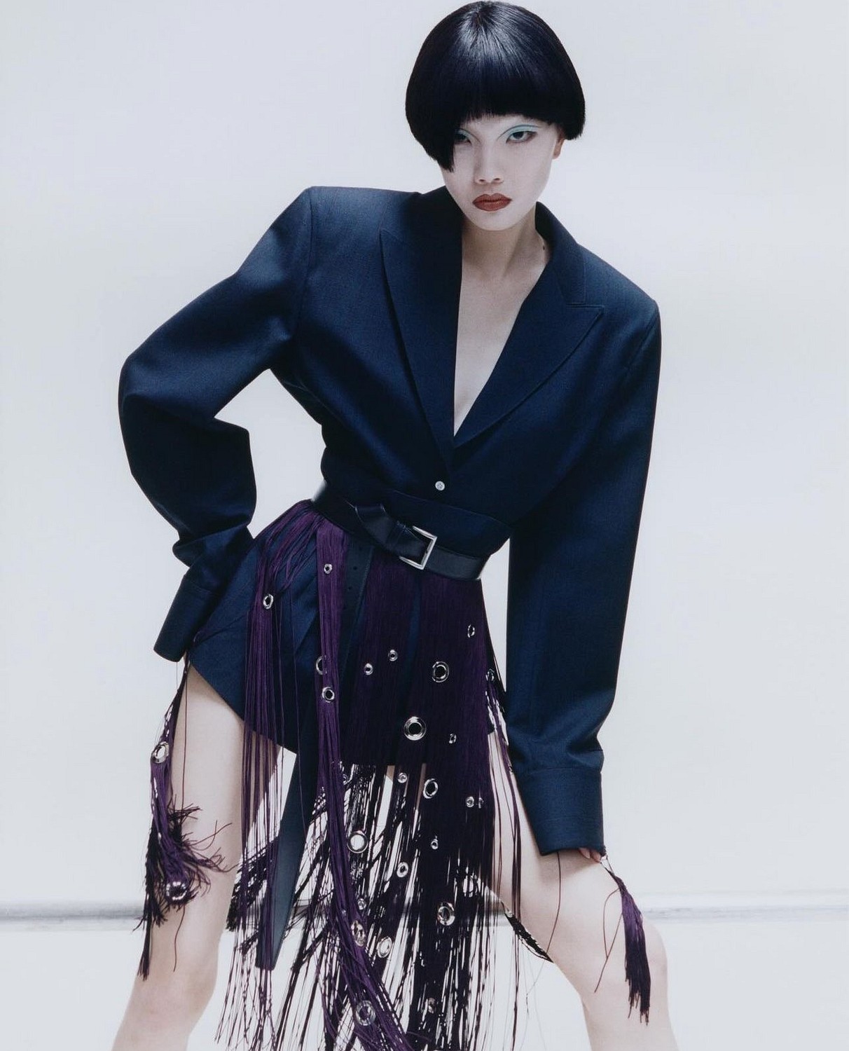 Sherry Shi in a tailored purple fashion editorial